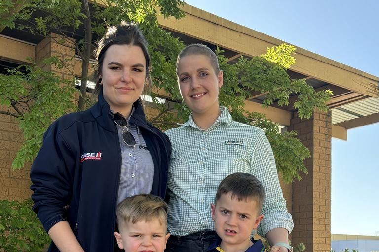 Emily Moore (right) with partner Sarvarna and son's Lincoln, 4, and Connor, 6. Photo: CAITLIN MENADUE