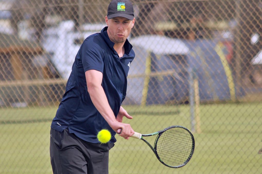 Drung South's Dale Schmid gets ready to hit a backhand.