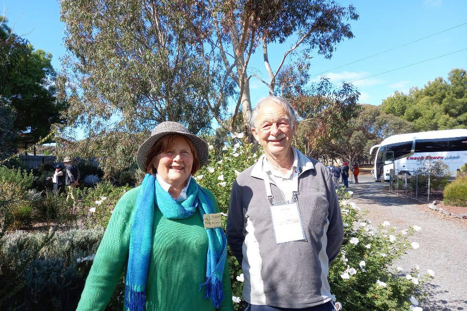 Mabel Brouwer shows Tasmanian conference delegate John Tabor some of the Australian plants in her Weldon Power Court, Horsham garden.