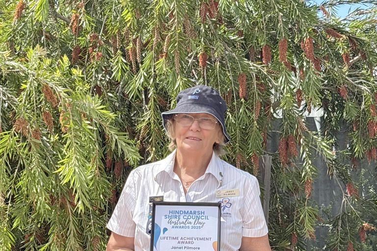 Janet Pilmore with her award.
