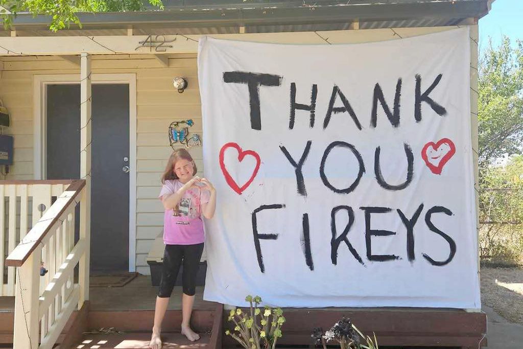 As Dimboola residents officially prepared to return to their homes late Tuesday after being evacuated almost 24 hours earlier, one little resident had a big message she wanted to share. Indie Francis, who lives in Lloyd Street, Dimboola, and her mum, Bree Myers, were scared they wouldn't have a home to return to after fires threatened the town. But thankfully, through the hard work of CFA members, the town has been saved, with barriers in place from potential flare-ups. Indie, 7, said that the CFA members were better than superheroes, and Bree agreed, thanking them for saving their home&nbsp;and&nbsp;the&nbsp;town.
