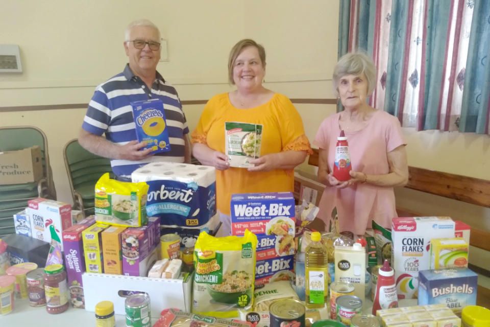 Daryn and Pam Clugston and Joy McLean with the groceries being donated to the Christian Emergency Relief Centre in Horsham.