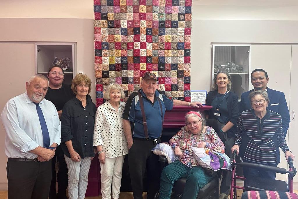 Shown admiring the quilt are (from left) Project Support Officer Bernie O&rsquo;Connor, Nurse Unit Manager Allison Hondow, Warracknabeal Historical Society&rsquo;s Jenny Taylor and Evelyn McColl, Yarriambiack Lodge residents Tim Clancy and Deb Norris, RNH CEO Jenni Masters, Executive Manager Clinical Services Joseph Bermudo and Lodge resident Rosalie Collins. Photo: MEL JEFFERIES