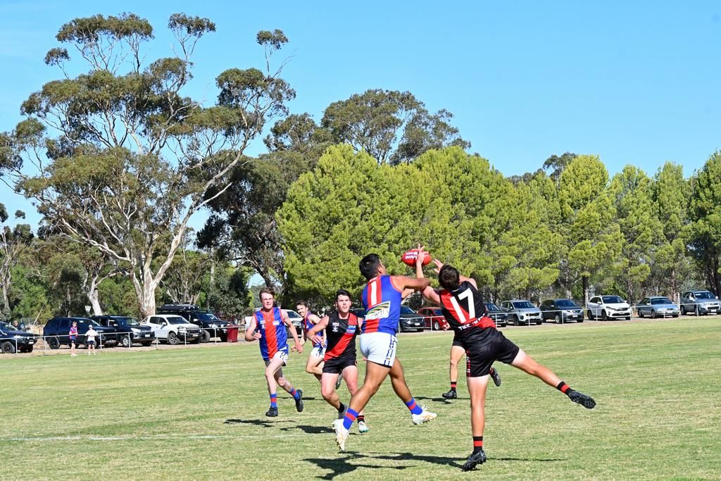Rupanyup's Daniel Weetra, left, and Noradjuha Quantong's Dylan Shelly battle for a contested mark.