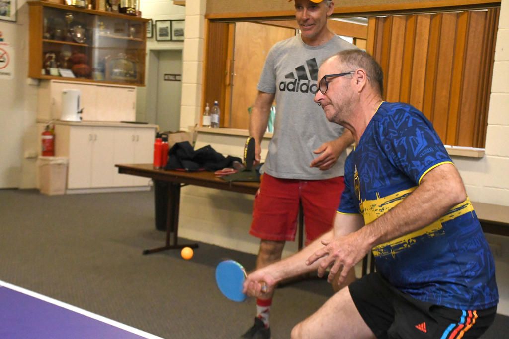 Jason Robinson is a picture of concentration as he returns a shot with partner Brad Martin at Brim on Monday night.