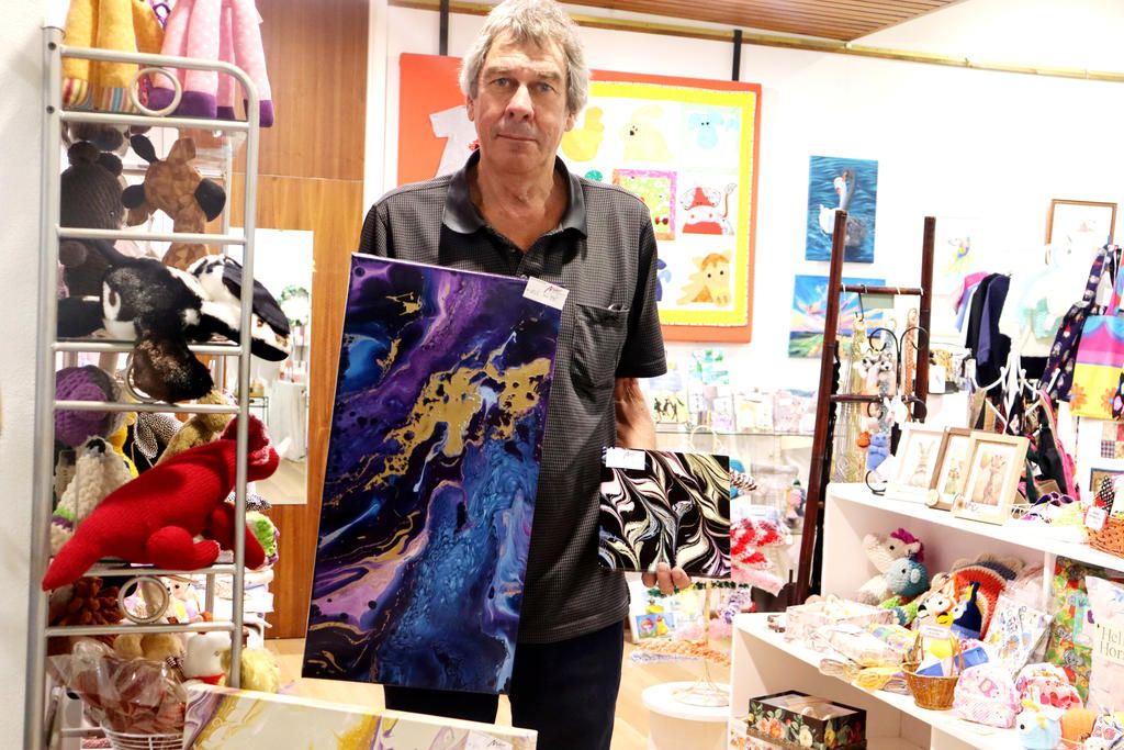 Artist Richard Allan with some of his work on display at the Makers Gallery and Studio in Horsham. photo: SHERYL LOWE