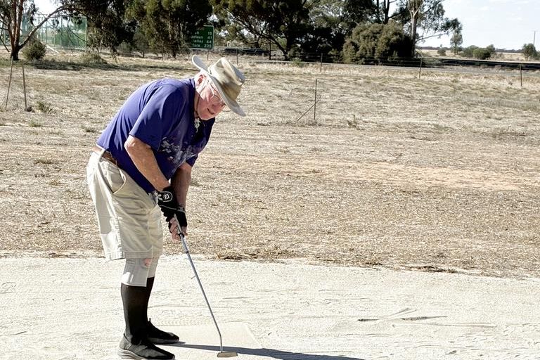 Rod Gardam sinks a nice putt.