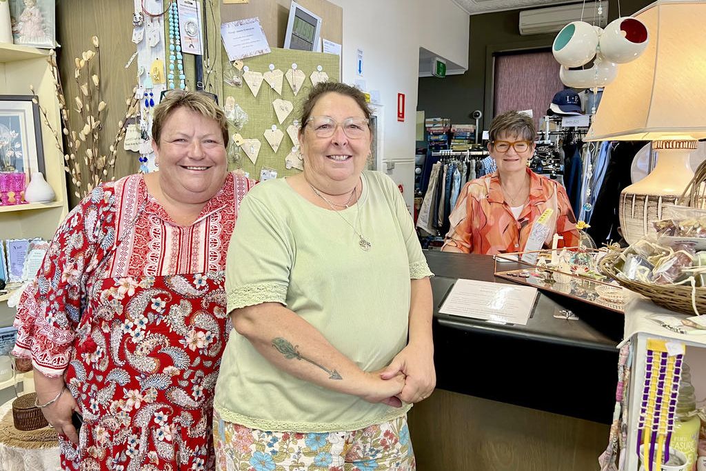 Ricsaa Op Shop volunteers Belinda Eckermann and Lynne Gould, along with one of the store managers, Gilda Cassidy (centre), inside the shop.