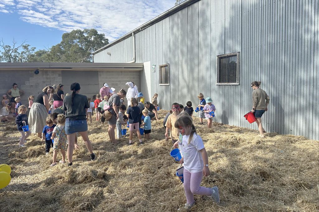 Children hunt for Easter eggs during the annual Easter egg hunt at the Dimboola A&P Shed.
