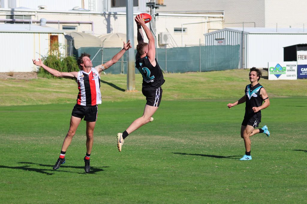 Swifts Jordan Motton takes a strong overhead mark. The Baggies' forward kicked seven goals against Edenhope Apsley.