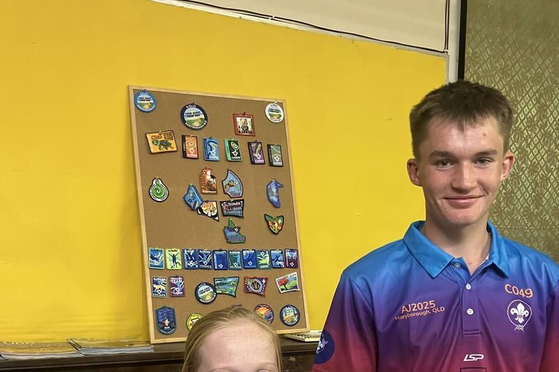 Rainbow Scouts Adalyn Clugston and Jasper Bigham share their jamboree experience with the Lions Club of Rainbow.