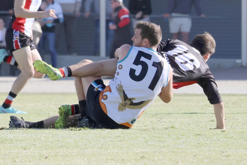 Tim Sanford tackles Jack Henry.