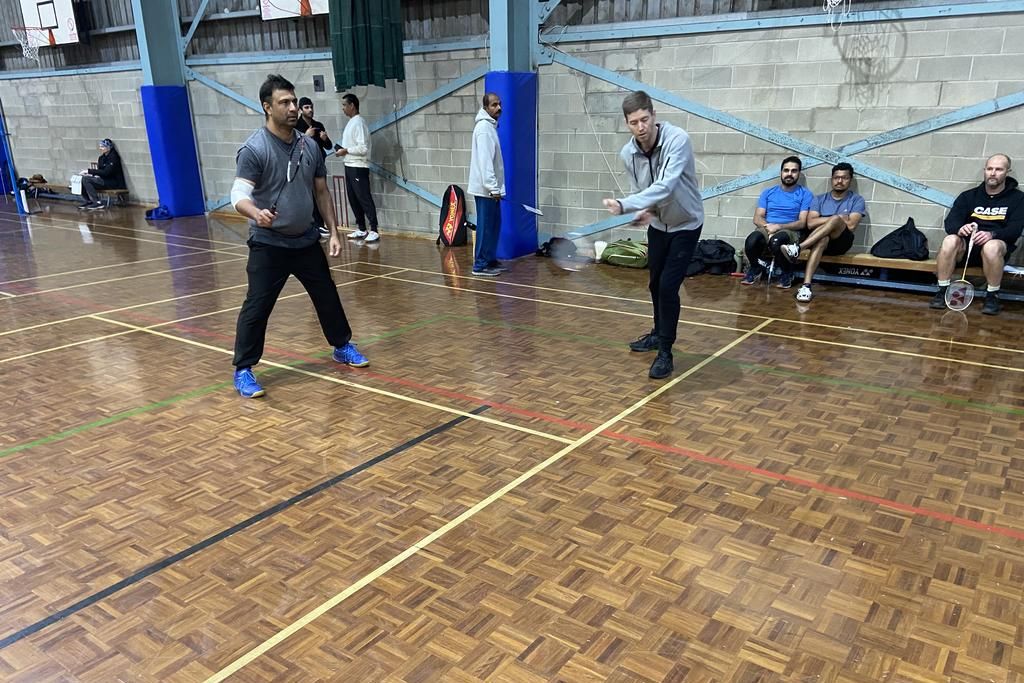 A Graders Sanjai Nair and Daniel Aitken in action.
