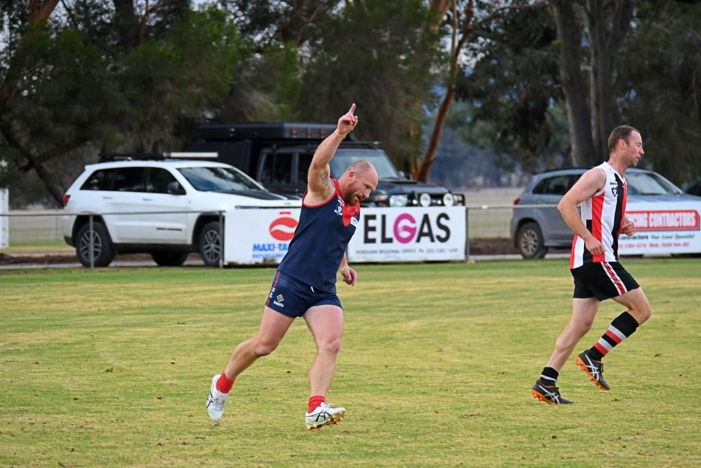 Laharum's Phil Butsch celebrates one of his five goals against Edenhope-Apsley during the Demons' 78-point win.