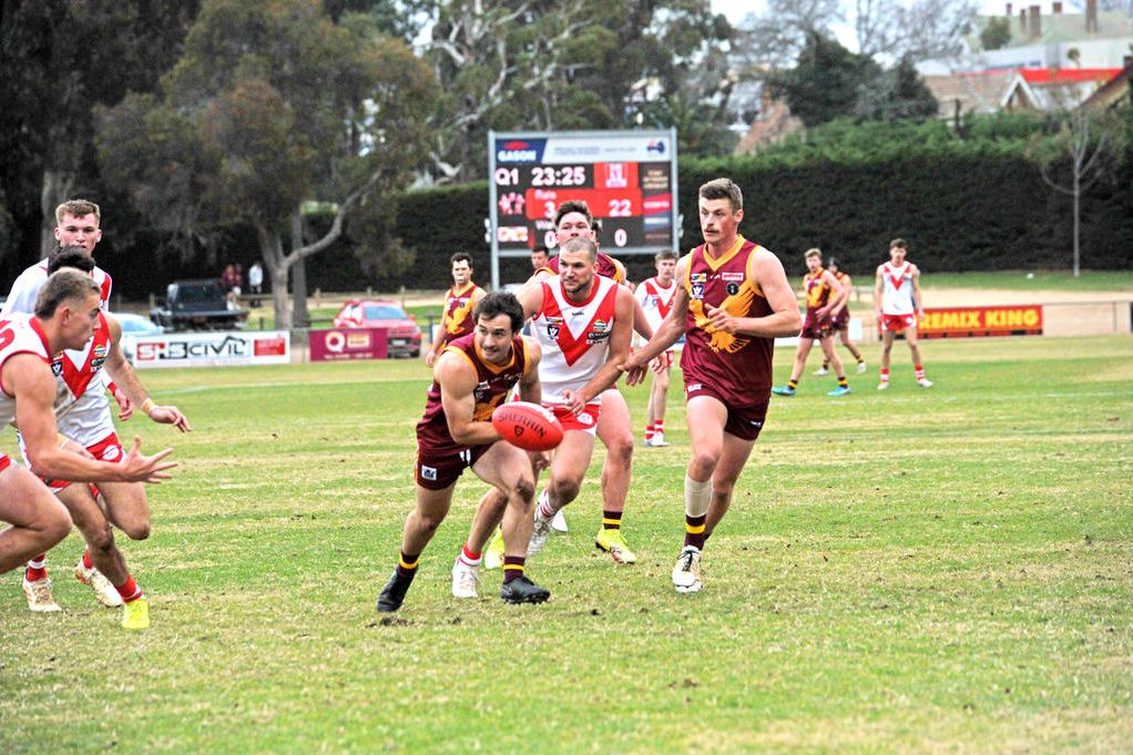 In a spirited contest plagued by strong wind, the Warrack Eagles battled fiercely against the reigning premiers, Ararat. Picture from ARARAT ADVOCATE