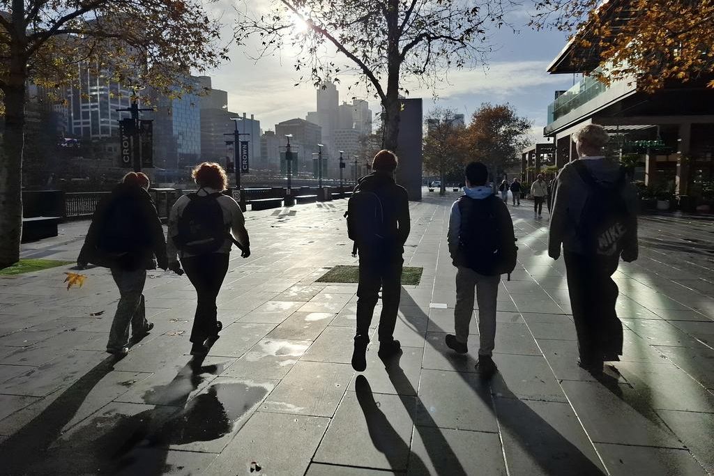 Year 11 students of the Hopetoun P-12 College, Claire, Mickey, Jakob and Esther, enjoying the city life at the South Bank of the Yarra River in Melbourne CBD.