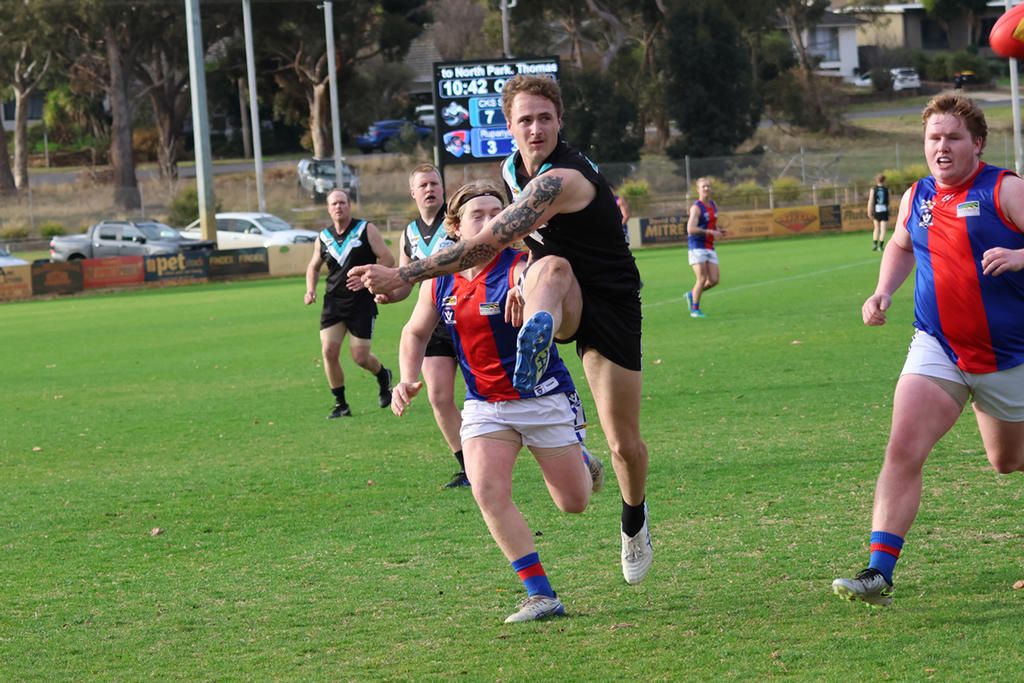 Jordon Motton kicks away for Swifts against Rupanyup