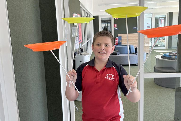 Rainbow P-12 College student Koby showing his circus skills during the workshop.