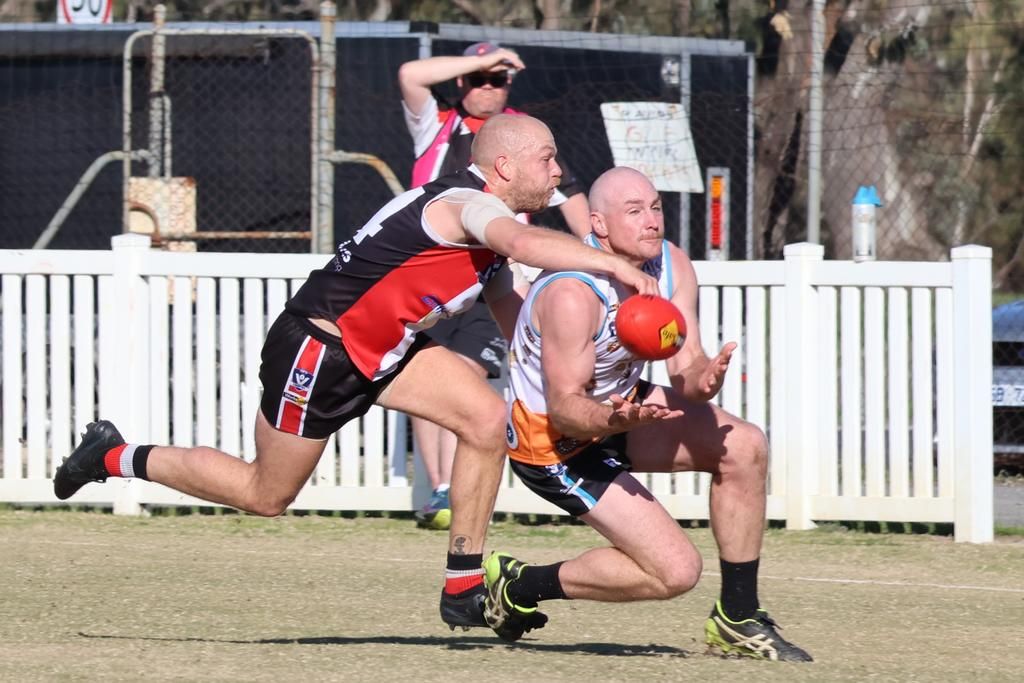 Southern Mallee Thunder's Riley Lehmann takes a great contested mark despite some attention.