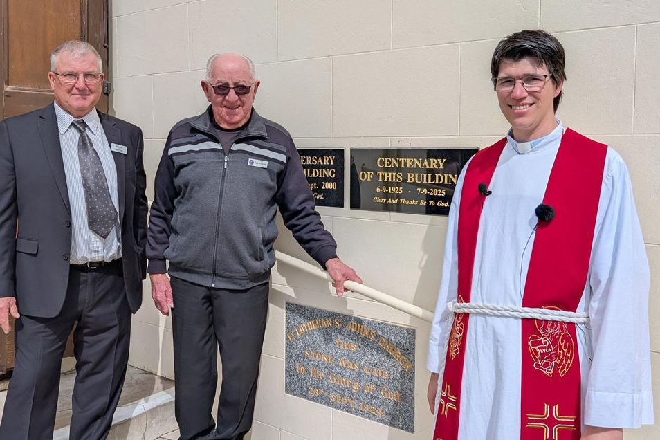 Chairman Wayne Werner, Ron Pipkorn, and current Pastor Carl Thiele pictured after unveiling of a commemorative plaque.