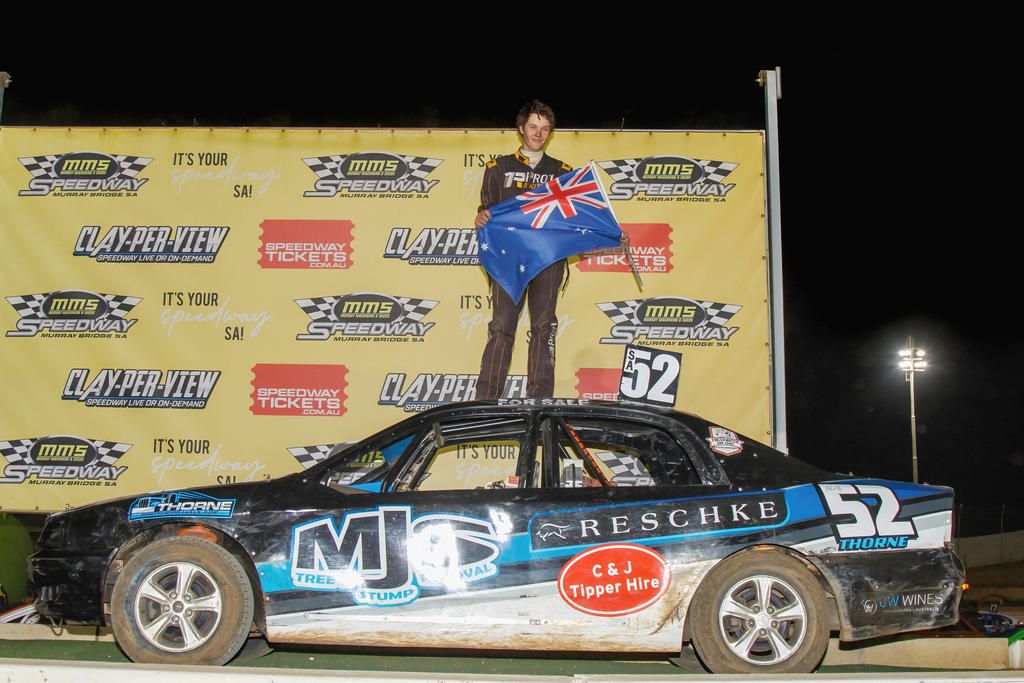 Nathan Thorne, pictured here after his Austalian Title win recently, will defend his Victorian Street Stock Title on Saturday night at Blue Ribbon Raceway.