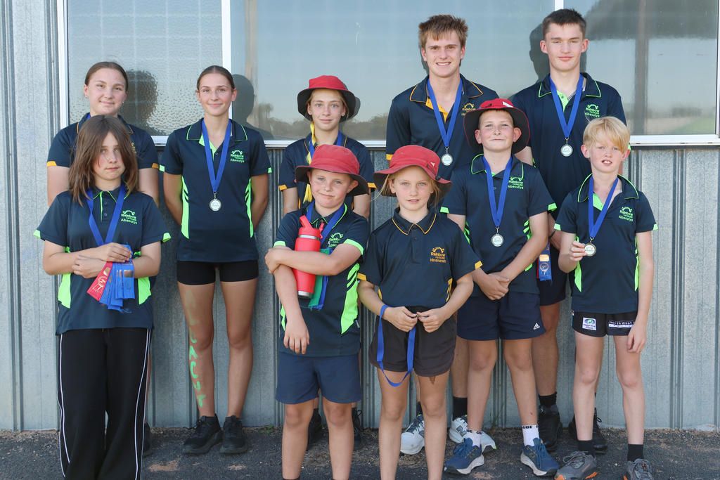 Age Group Champions- Back Row: Giaan, Pippa, Kaija, Clancy, Jasper. Front Row: Bell, Logan, Poppy, Hendrix, Xavier.