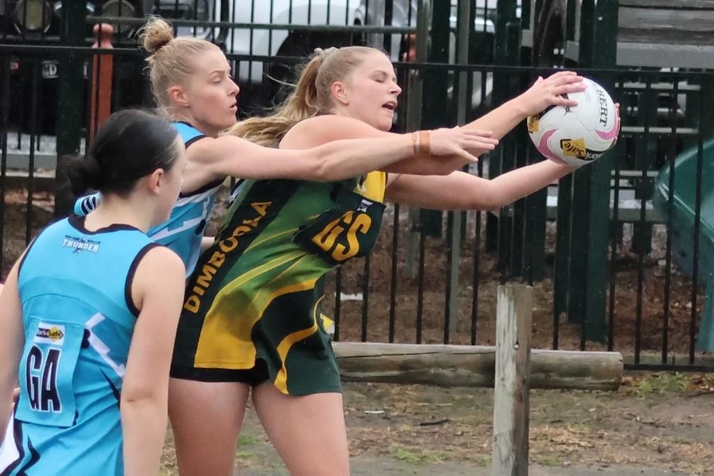 Nicole Polycarpou gets the ball in front of Connie Rule.