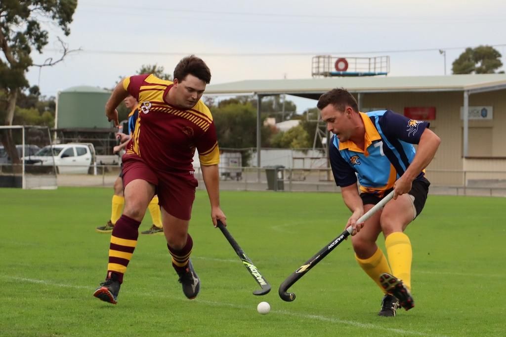 Warrack Hoops&rsquo; Oskar Bennett and Nhill Rangers&rsquo; Sam Bone fight for possession.