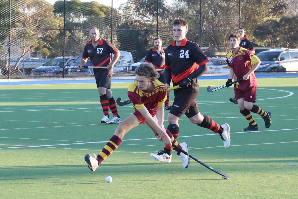 Warrack Hoop Ben Williamson, who scored the only goal for the game, in action against the Horsham Hurricanes.