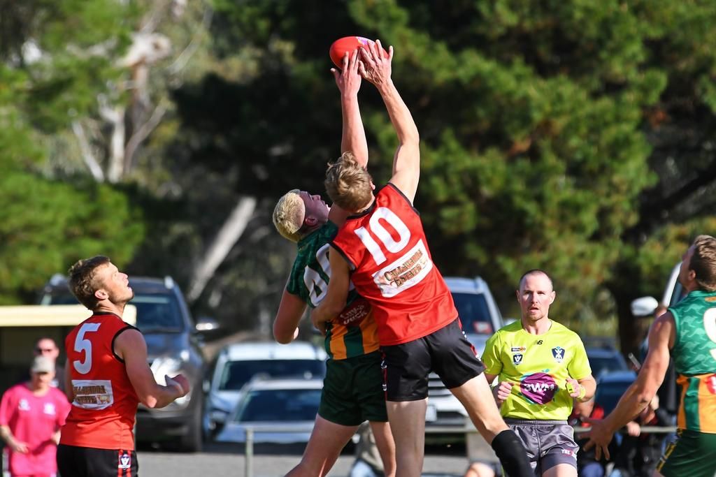 Dimboola's Declan Paech and Stawell's Josh Fowkes compete to win the tap.