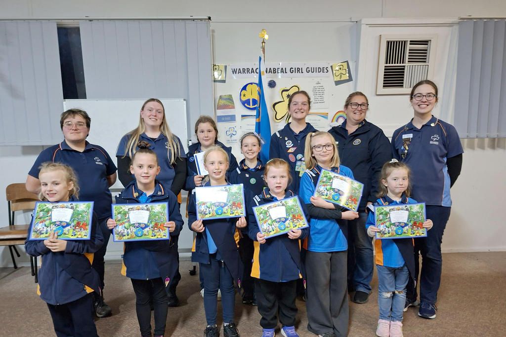 Warracknabeal Girl Guides two units pictured together, with leader Kirsty Holland, leader in training, Delie Rowe, and unit helpers Brooke McKenzie and Lucy Schilling.