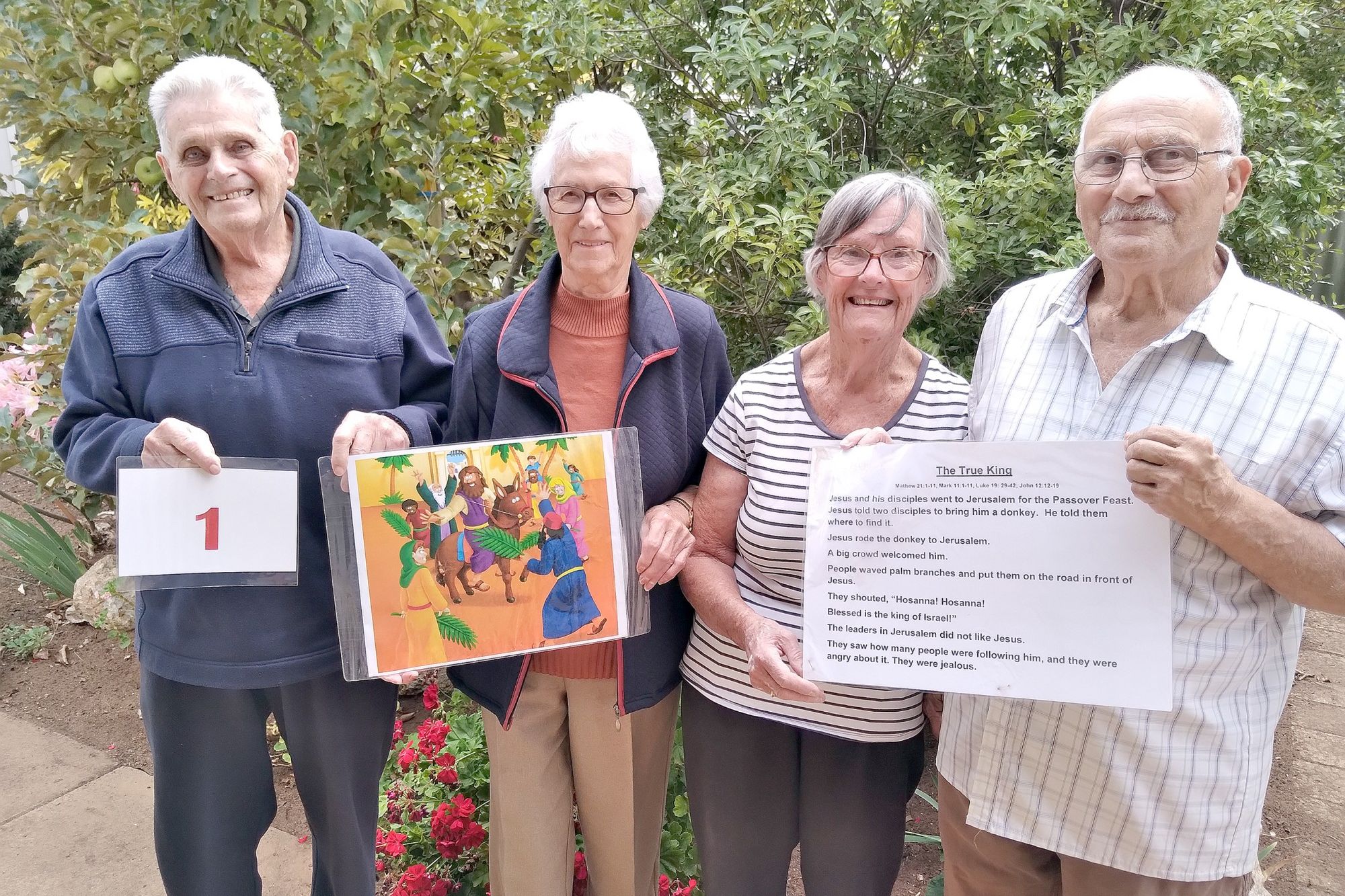 Norrie and Lois Poulton, and Jan and Allan Fenech position the posters around Lake Lascelles in Hopetoun for the Easter Trail.