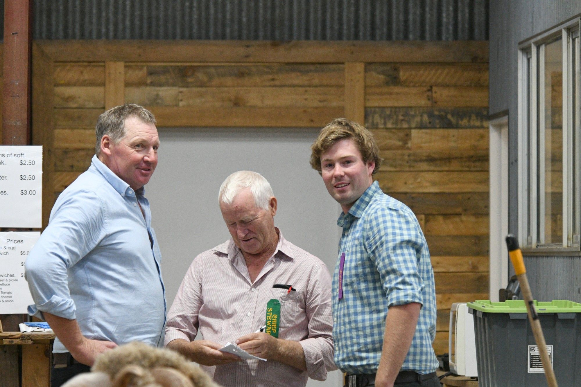 Judges Ben Hartwich and Paul Hendy of Marnoo with show chief steward Kevin Crook.