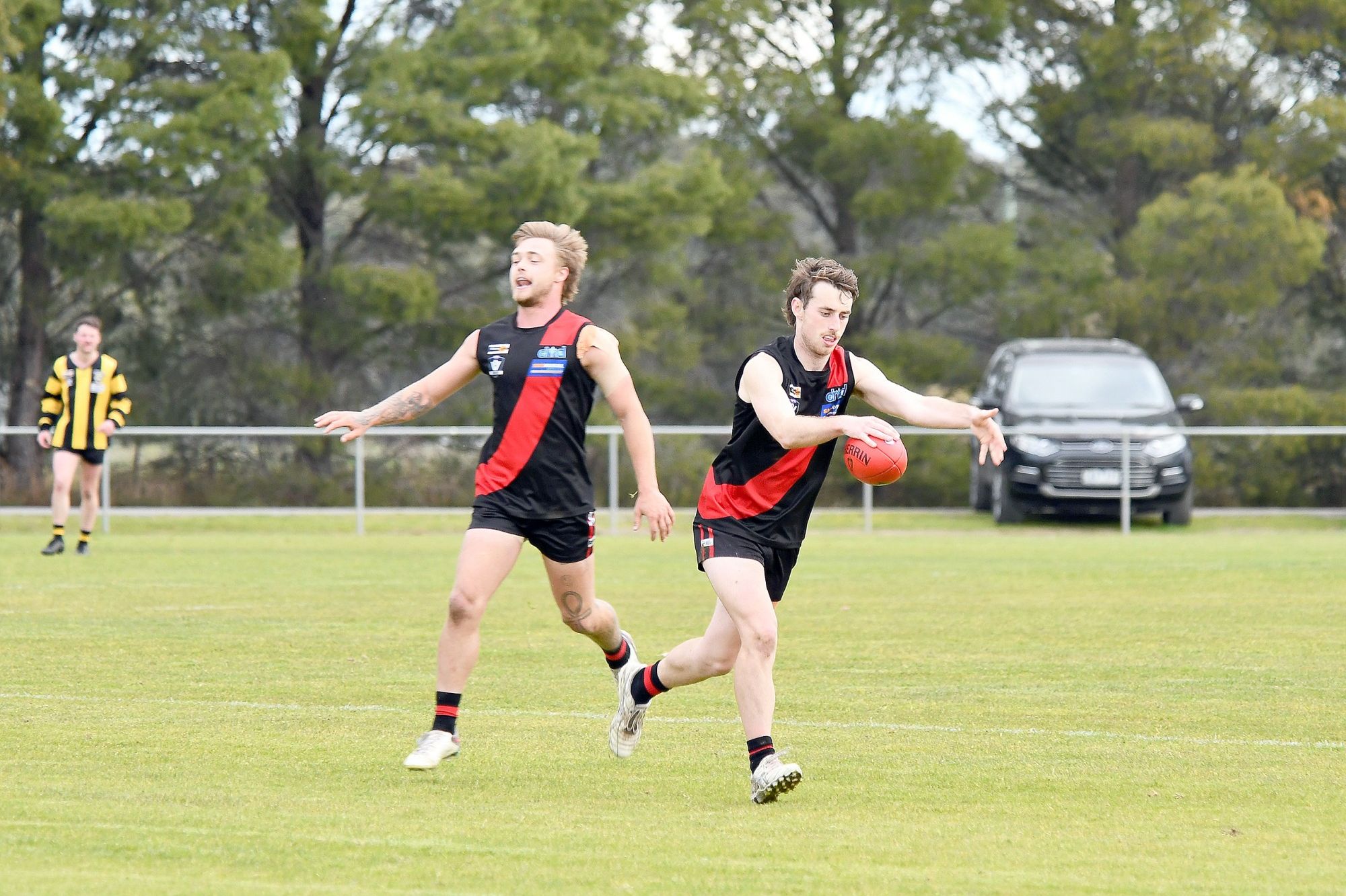 Noradjuha-Quantong captain Wade Francis sends his team forward as team-mate Jayden Besford provides support against Pimpinio on Saturday.