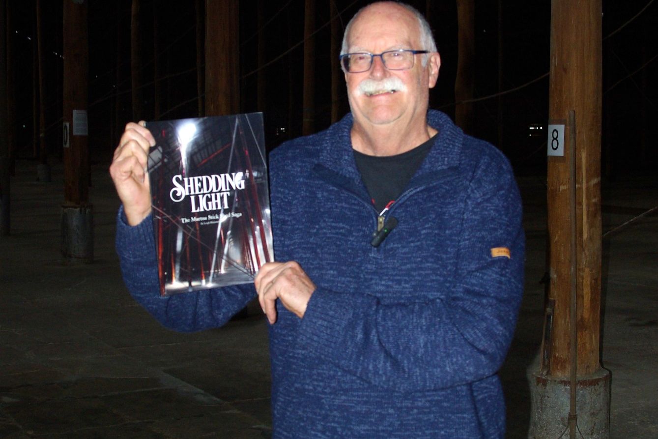 Leigh Hammerton with his book Shedding Light.