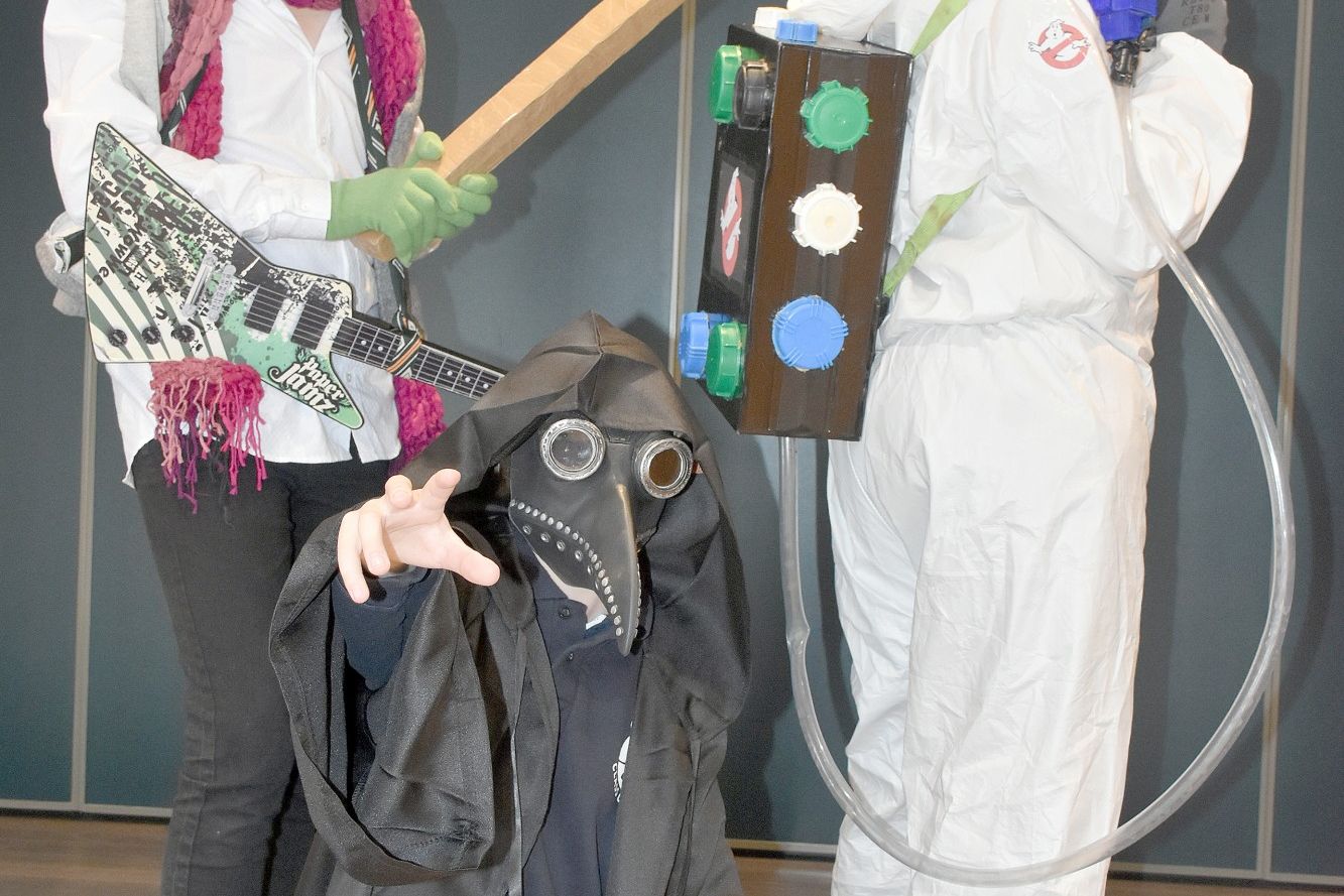 Sam, Pax and Lachie are ready for action at the 2023 Book Week costume parade, showcasing their favourite characters