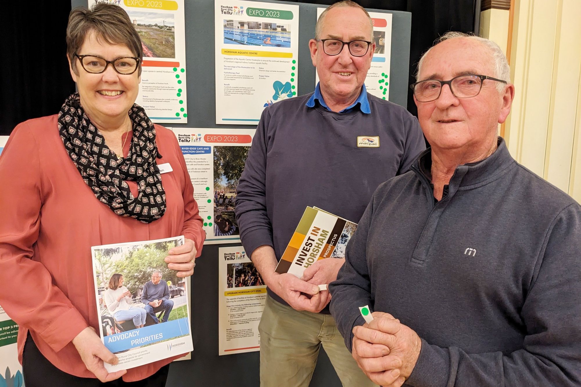 Horsham Rural City Council grants officer Susan Surridge discusses council projects with community members Scott Johns and Ron Dodds during the Engagement Expo.