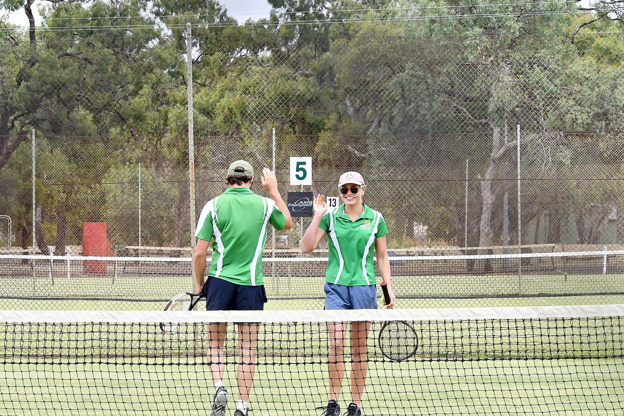 High fives were on offer during Horsham Lawn mixed doubles when Daniel Taylor and Anna Naylor took on Haven's Lewis Gebert and Sarah Hateley.