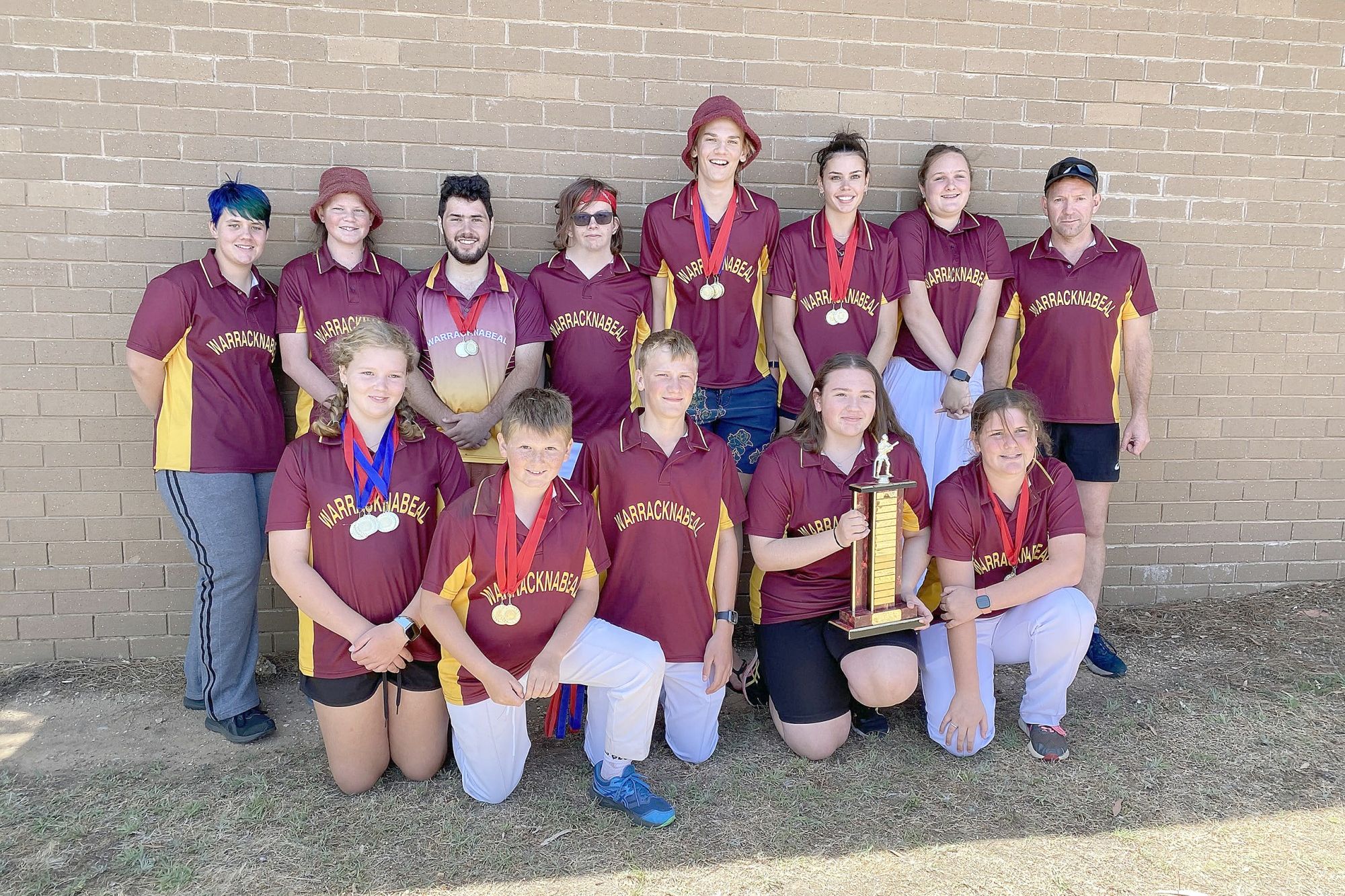 Back, left to right: Kiara Cooksley, Logan Mansfield, Rohan Richards, Benjamin Holland, Cody Polack, Bella Orszulak, Hayley Bentley, and coach Clinton Jonasson. Front, left to right: Ellie Williamson, Zander Jonasson, Hayden Polack, Milly Jonasson, Maddison Bentley.
