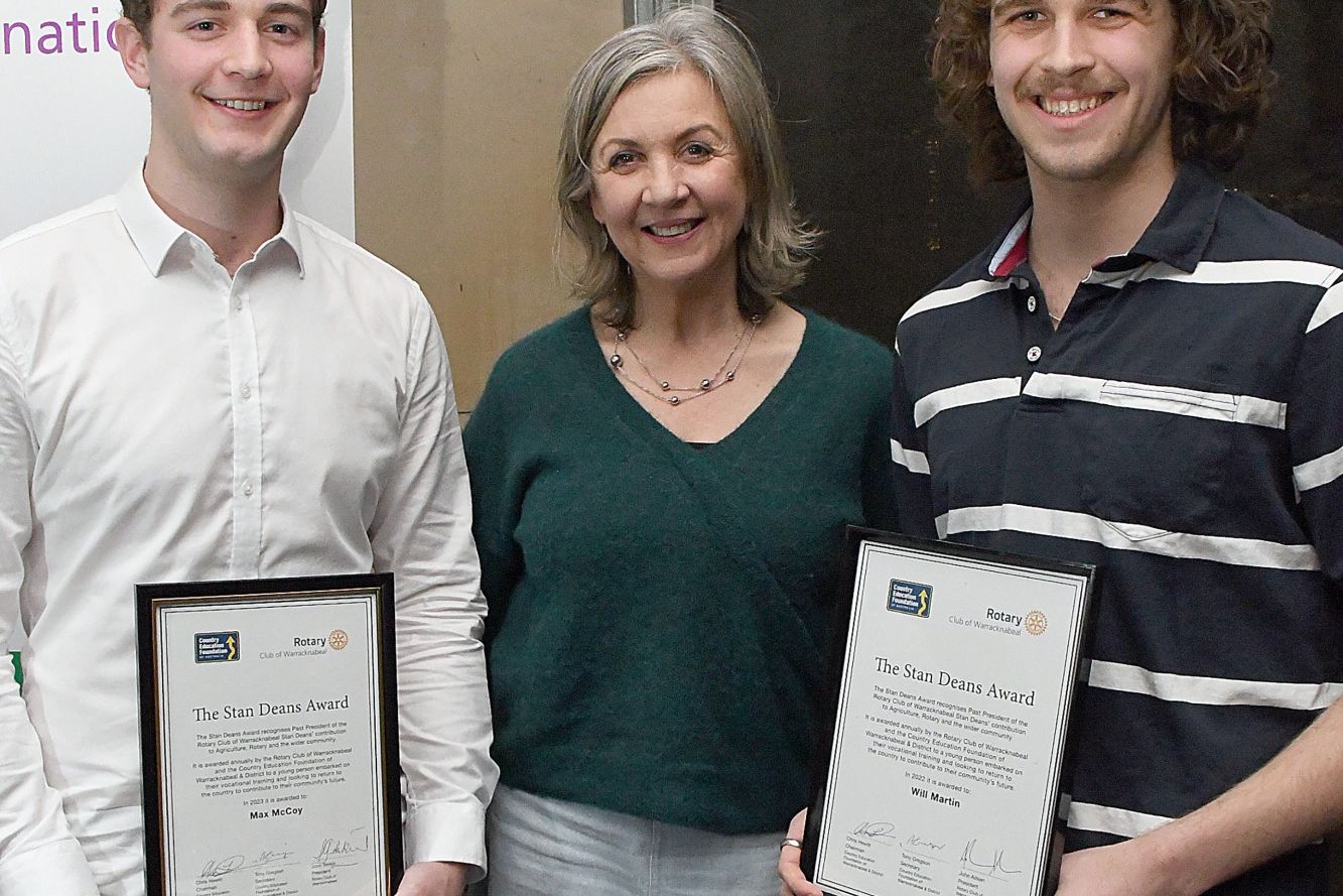 Michelle Kinsman presents the Stan Dean Award, in honour of her father, to Max McCoy (left), along with last year's recipient Will Martin.