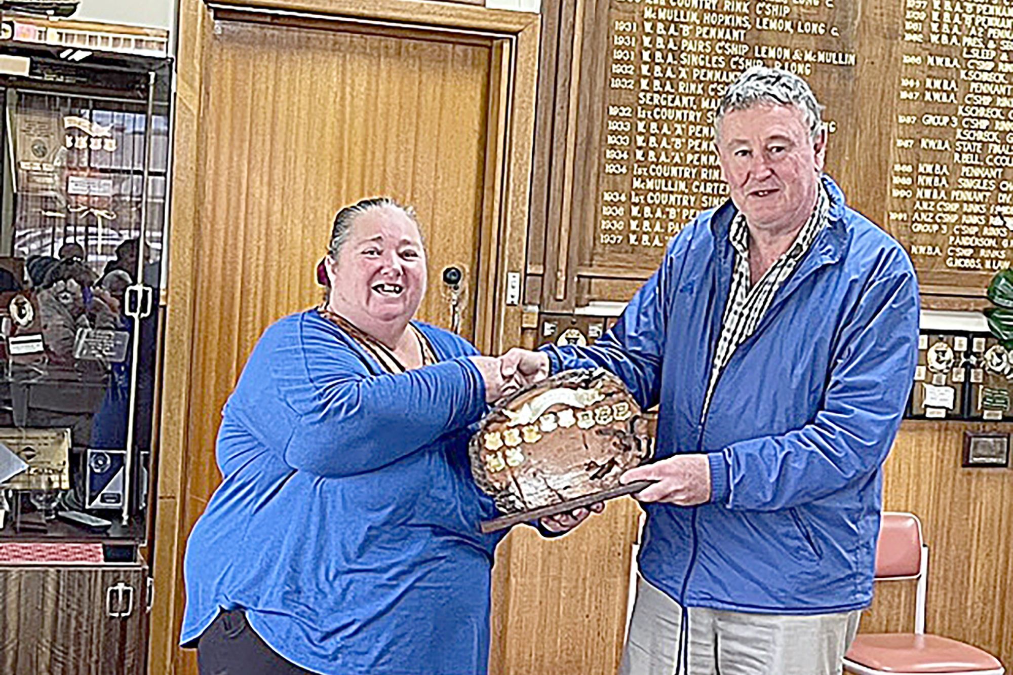 Debra Steed and Barry Cramer with shield