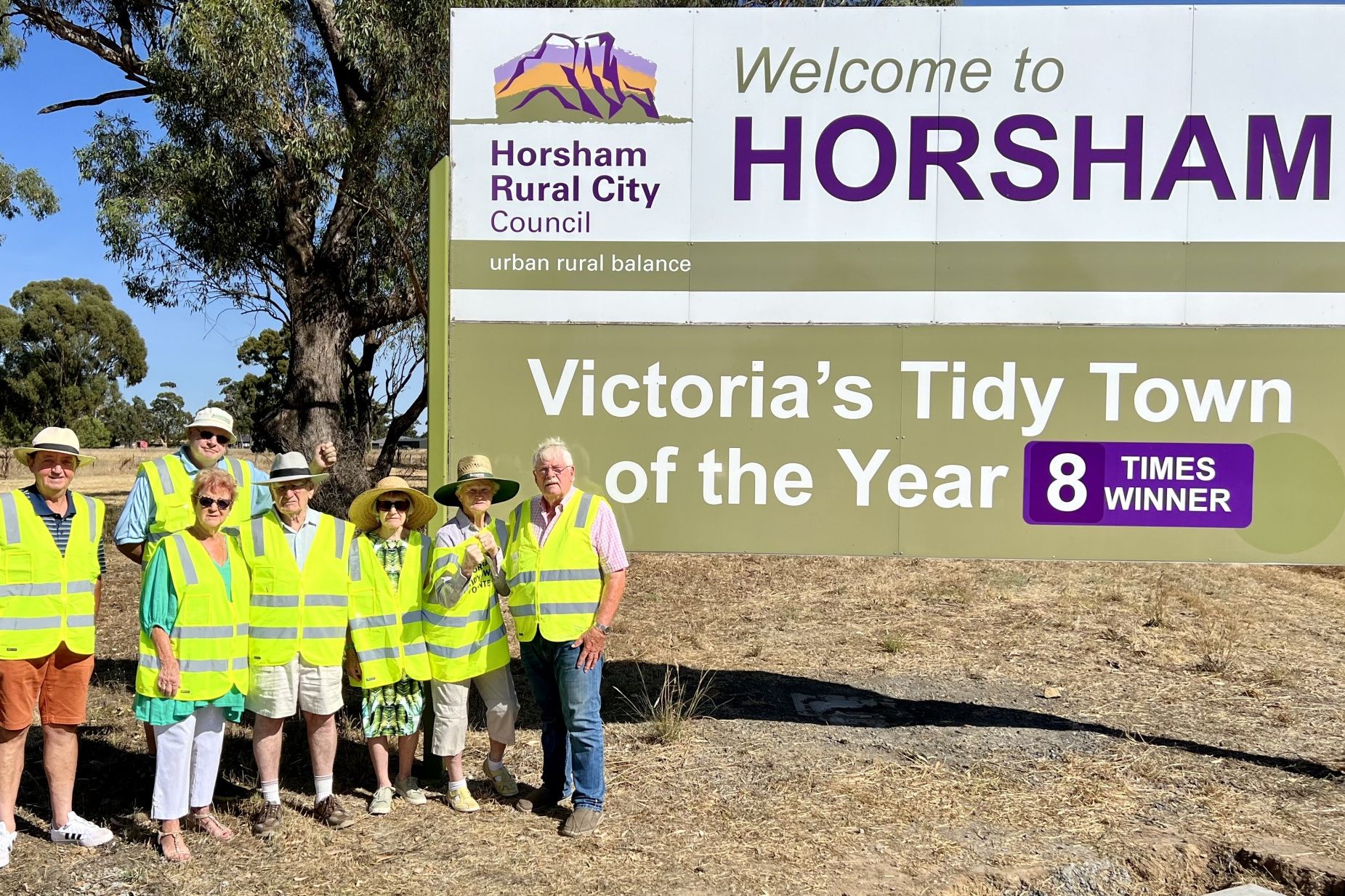 Horsham Tidy Towns committee members Daryl Dower, Jan Morris, Neil King, Gary Aitken, Cheryl Linke, Kola Kennedy and David Eltringham in the front of the former Stawell Road sign.