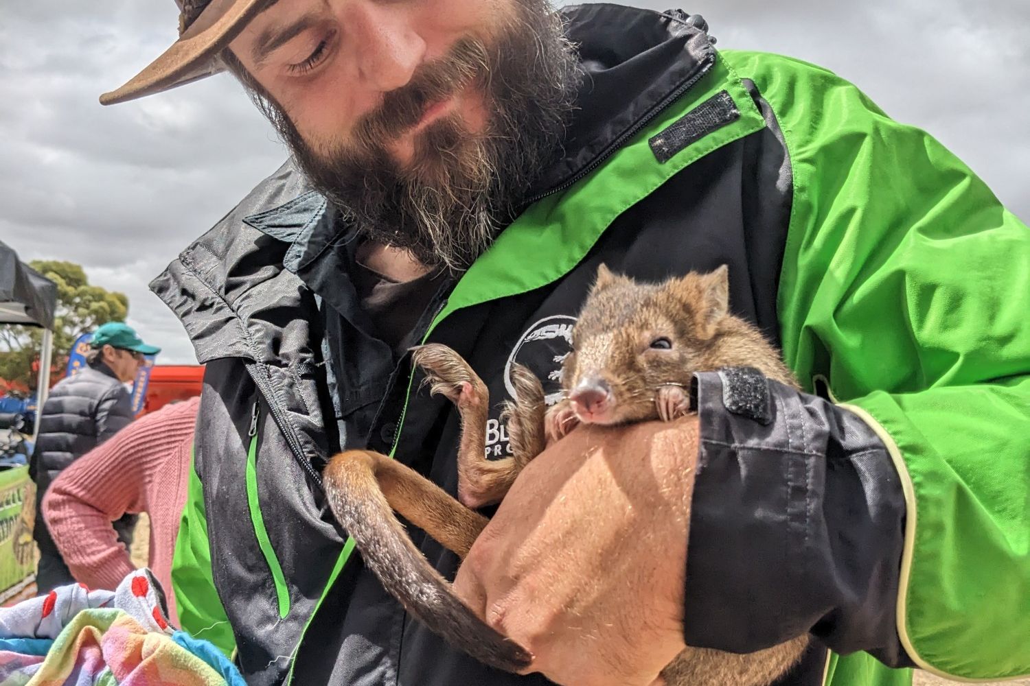 Black Snake Production co-owner Mike Alexander holds a woylie or brush-tailed bettong, one of many wildlife attractions at the Field Days.