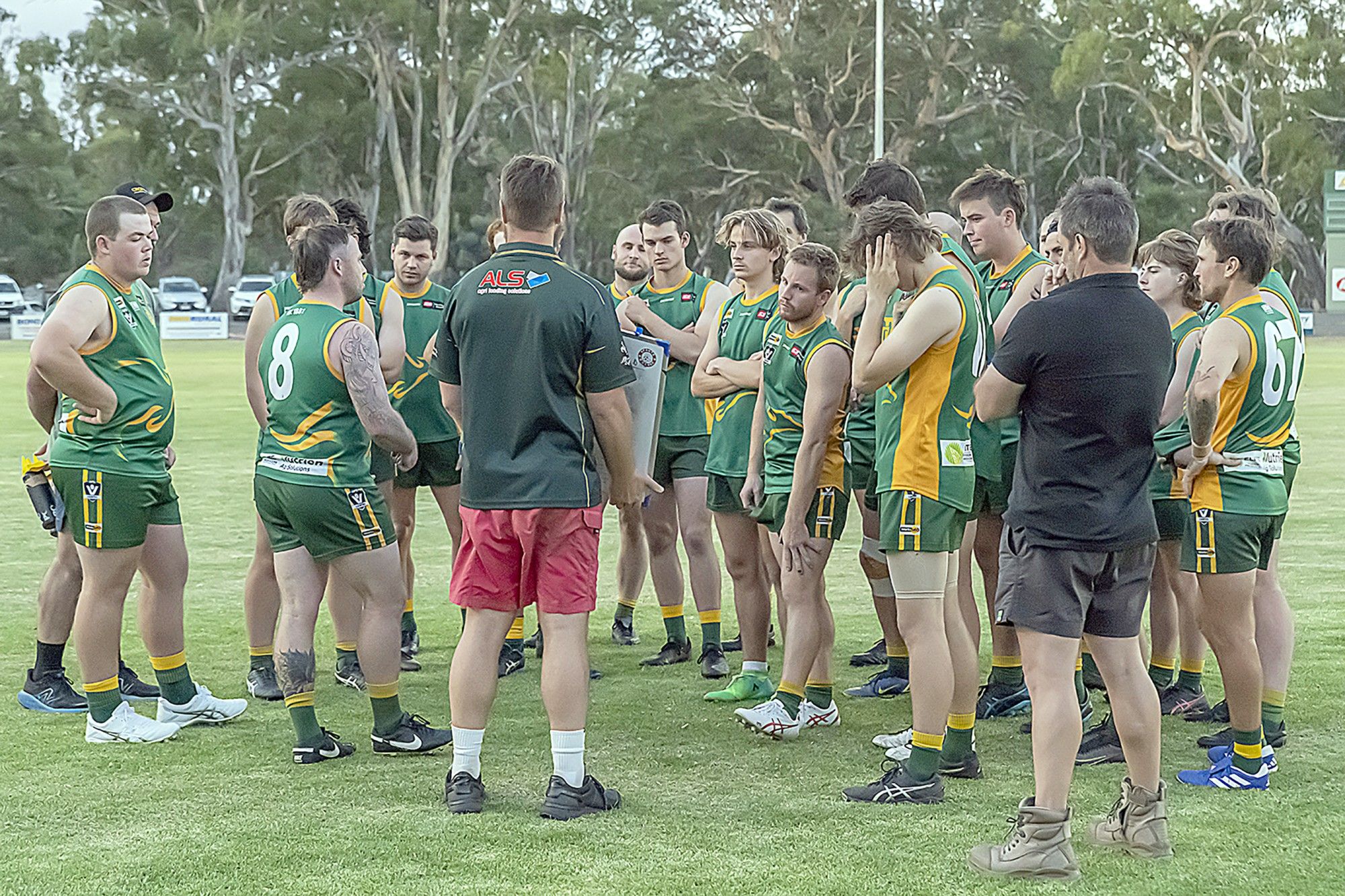 Dimboola coach Jack Landt address his charges during at quarter break on Friday night.