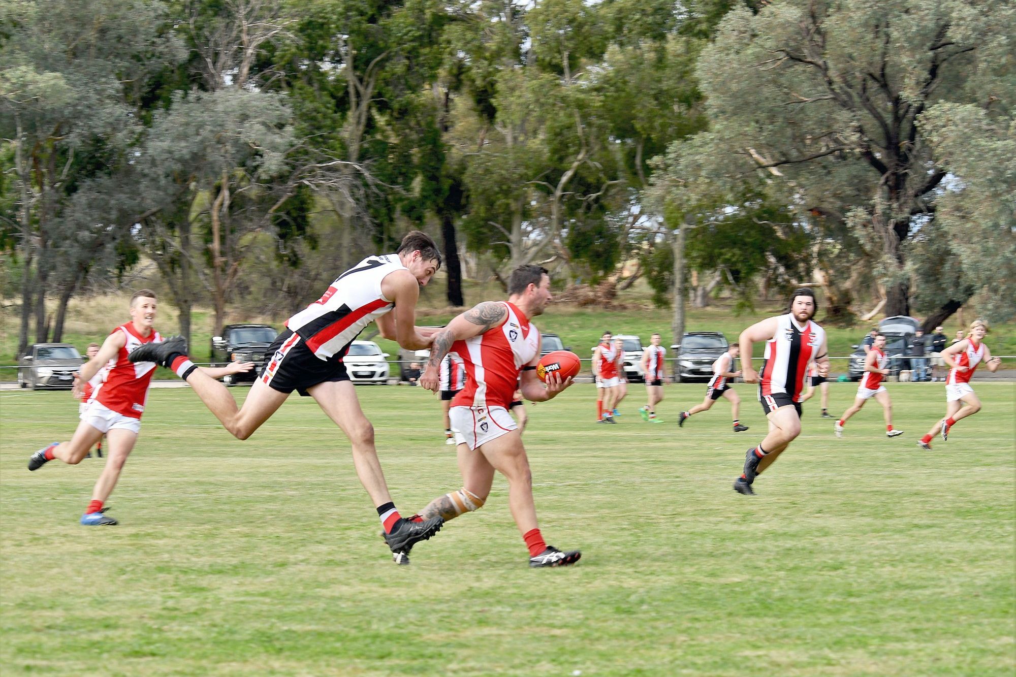 Edenhope-Apsley's Bernard Kealy tackles Taylors Laker opponent Tom Beugelaar.
