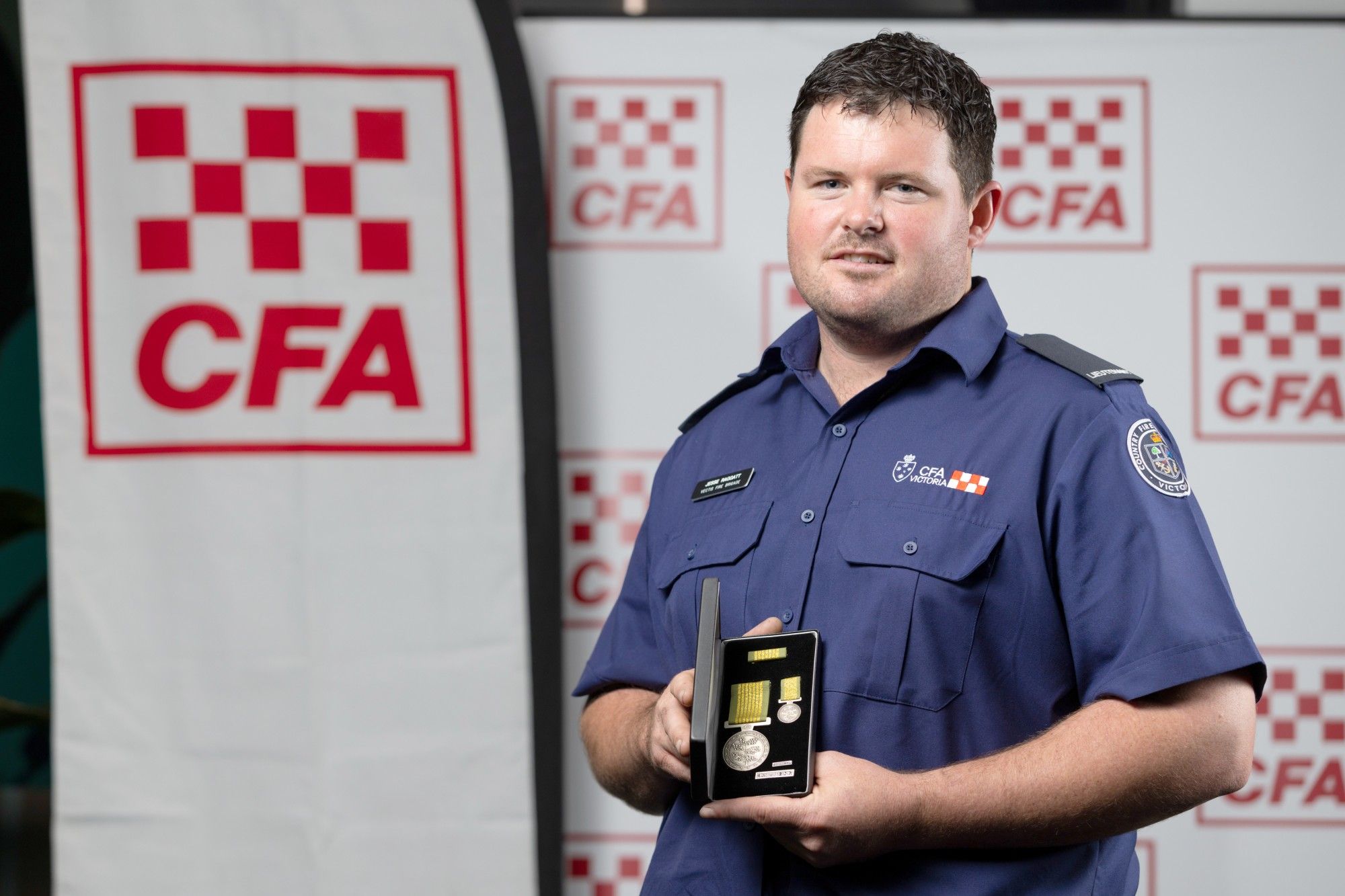 Jesse Raggatt of the Horsham group of brigades with his National Emergency Medal.