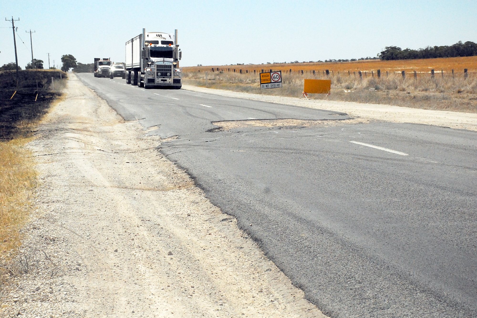 One of the region's main routes for heavy traffic lies damaged.