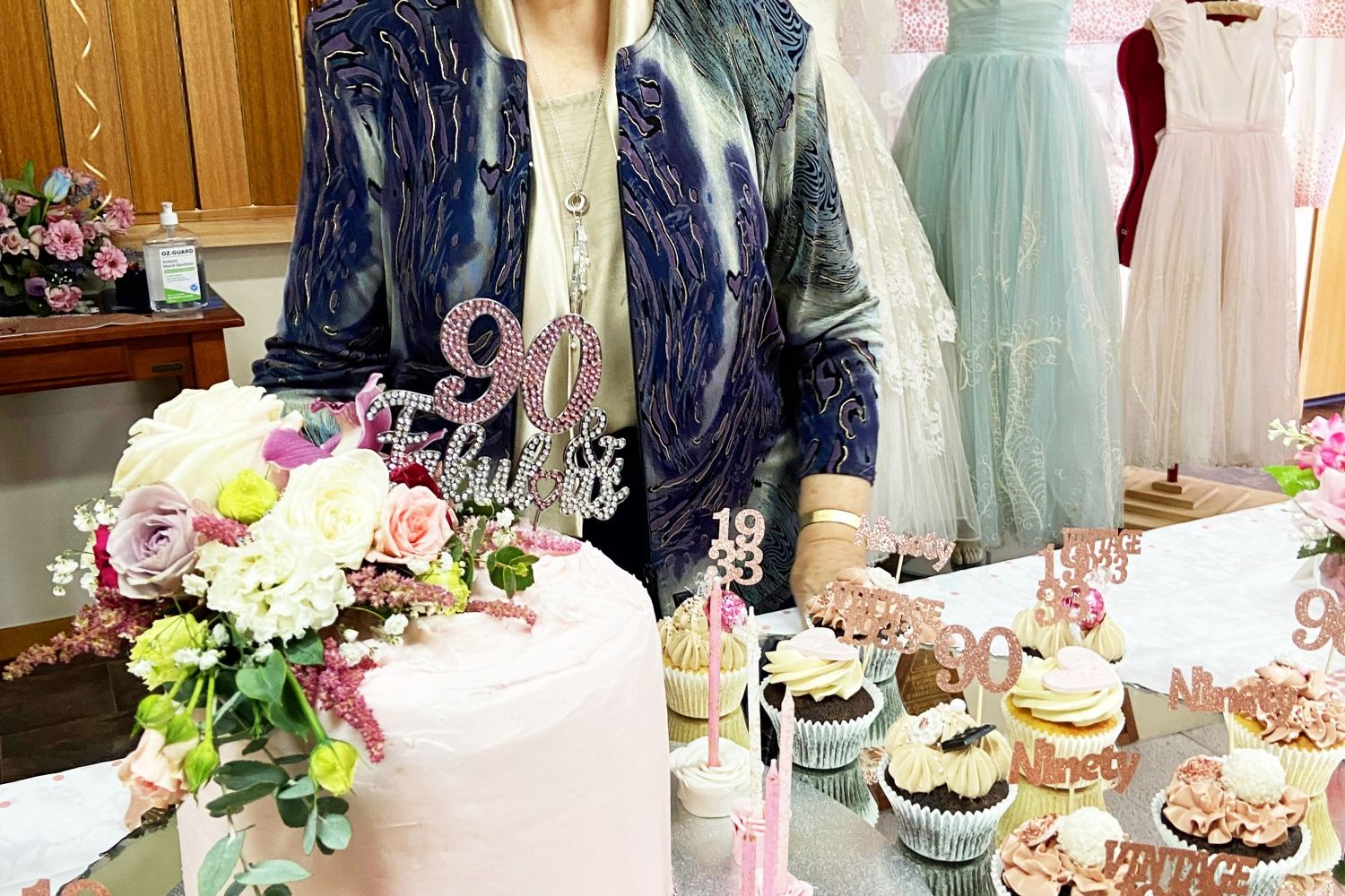 Lois McKenzie with the cake designed by her daughter Lynne.
