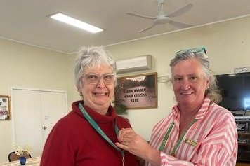 Willenabrina CWA president Prue McCreddin pins the secretary&rsquo;s badge on the group's incoming secretary Judy Lynch.