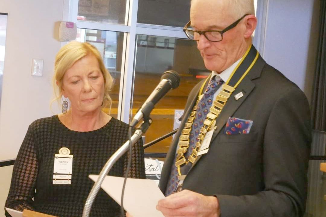 Horsham East Rotary Club outgoing president Jim Delahunty inducts new president Wendy Lang.